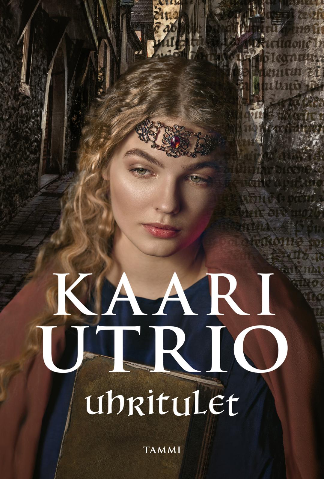Etukansi. Kaari Utrio. Uhritulet